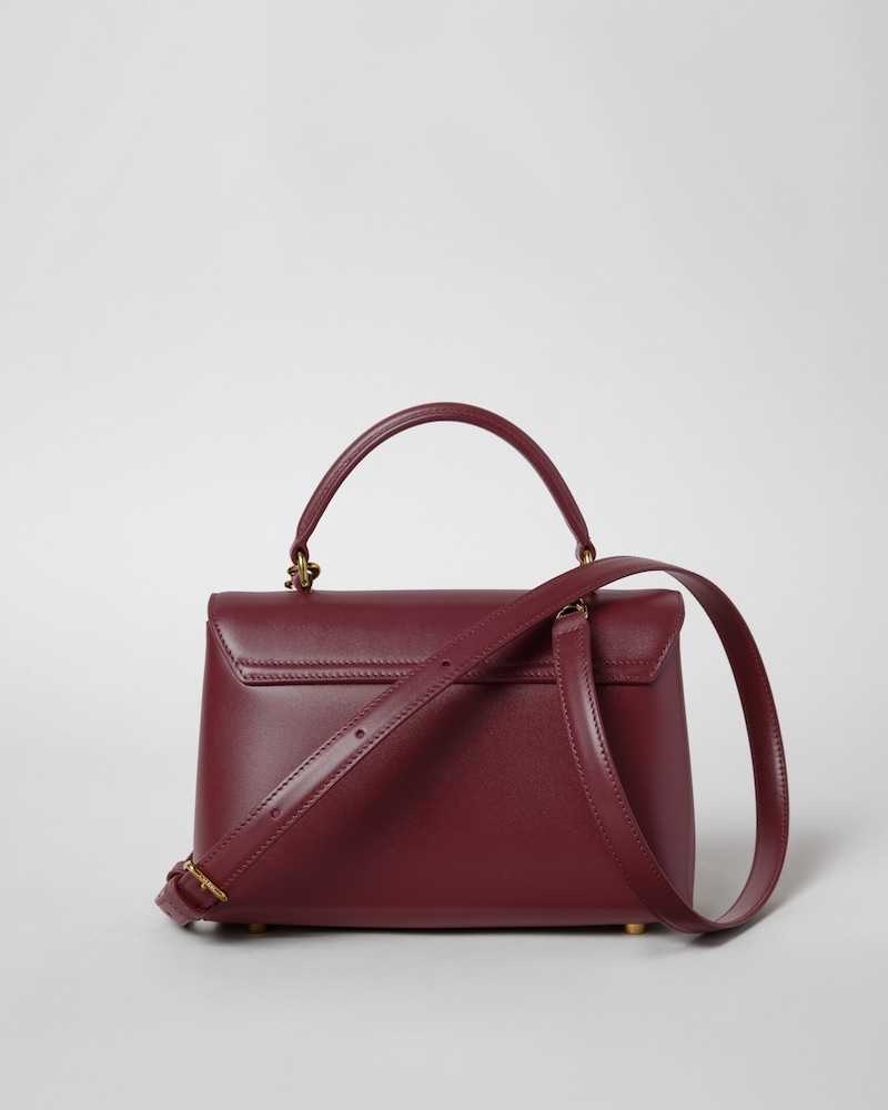 TEEN NINO BAG IN SMOOTH SATINATED CALFSKIN WITH ENAMEL CLOSURE - SYRAH - EVENING - 1 | CELINE