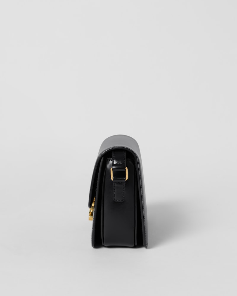 TEEN TRIOMPHE BAG IN SHINY CALFSKIN WITH ENAMEL CLOSURE - BLACK - ALL BAGS - 1 | CELINE
