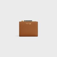COMPACT WALLET TRIOMPHE STAMP IN SUPPLE GRAINED CALFSKIN - SOFT TAN / SOFT CREAM - WALLETS - 1 | CELINE