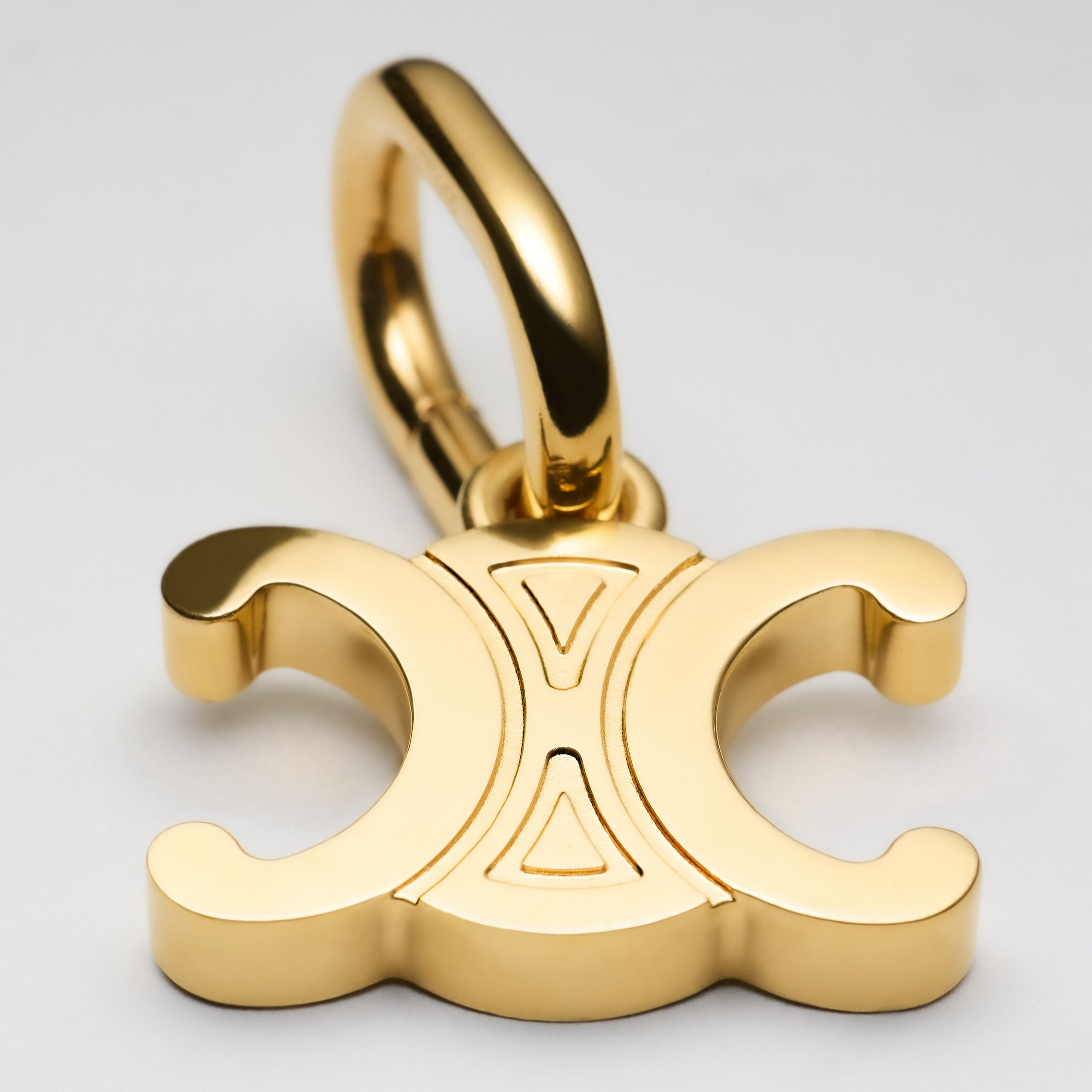 CELINE CHARMS TRIOMPHE IN BRASS WITH GOLD FINISH