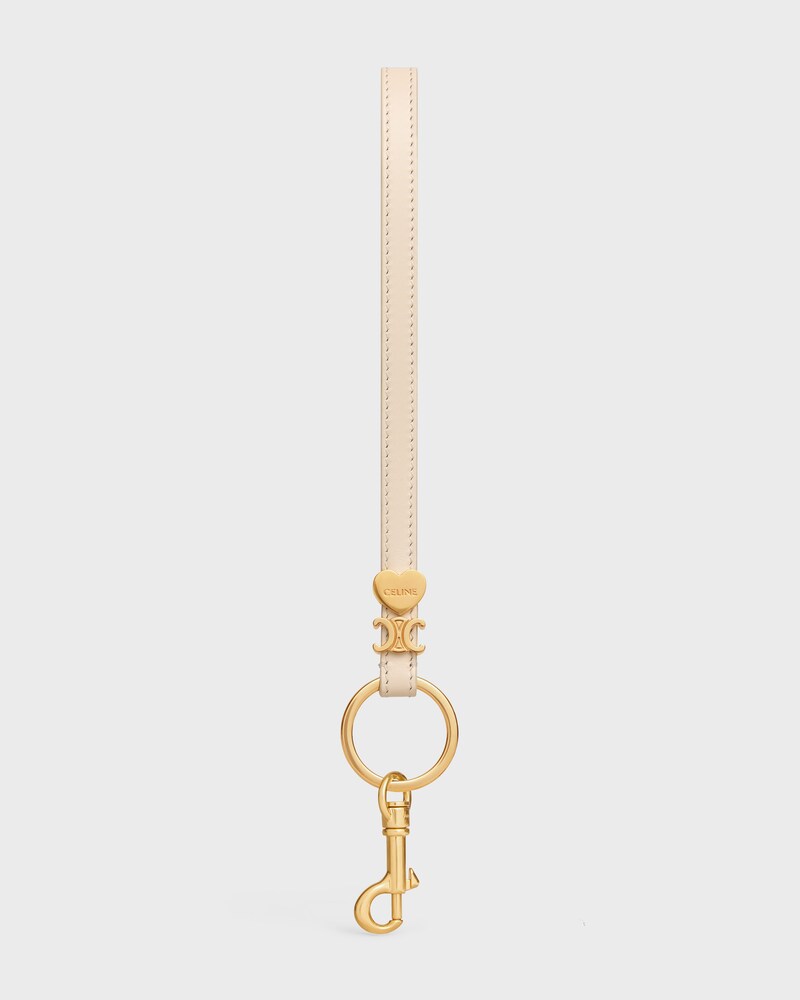 TRIOMPHE CHARM IN SMOOTH CALFSKIN - CREAM - CHARMS AND ACCESSORIES - 1 | CELINE