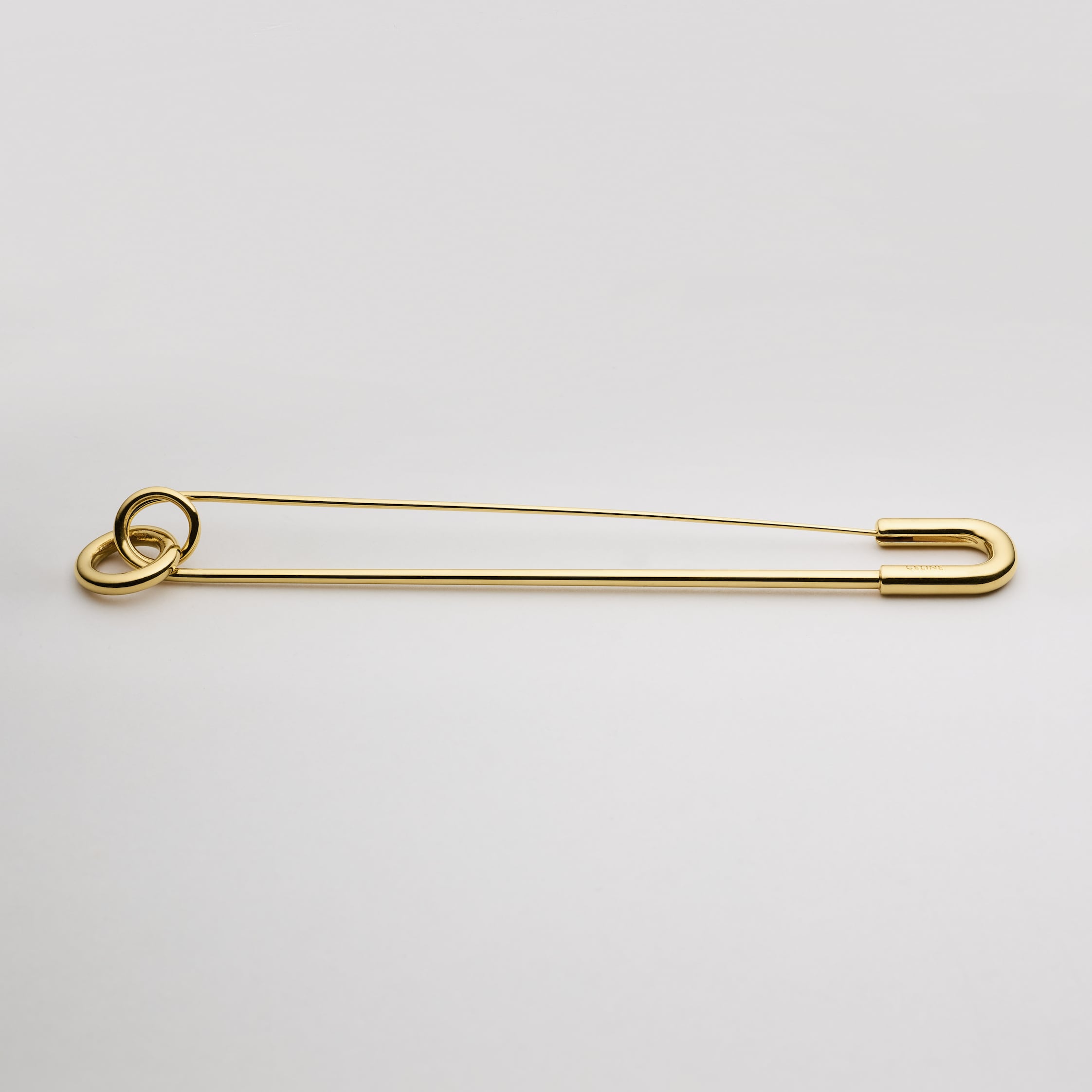 CHARMS SAFETY PIN BROOCH IN BRASS WITH GOLD FINISH - GOLD | CELINE