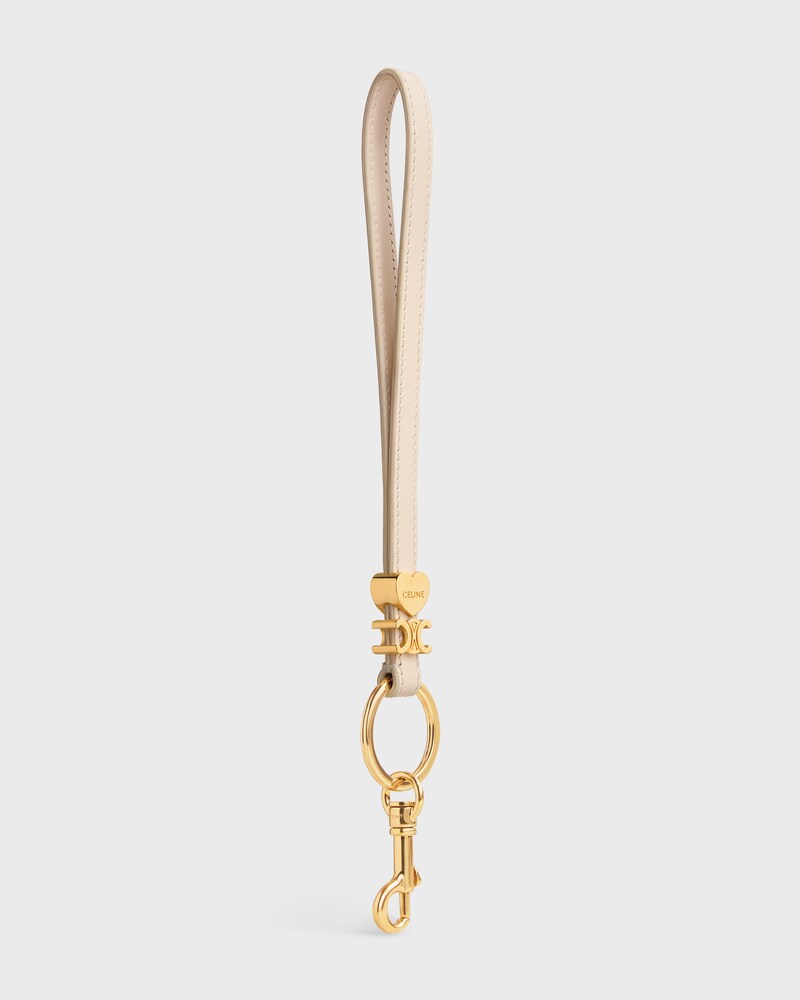 TRIOMPHE CHARM IN SMOOTH CALFSKIN - CREAM - CHARMS AND ACCESSORIES - 1 | CELINE