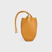 SMALL DROP BUCKET IN SUPPLE SMOOTH CALFSKIN - MARIGOLD - BUCKET - 2 | CELINE