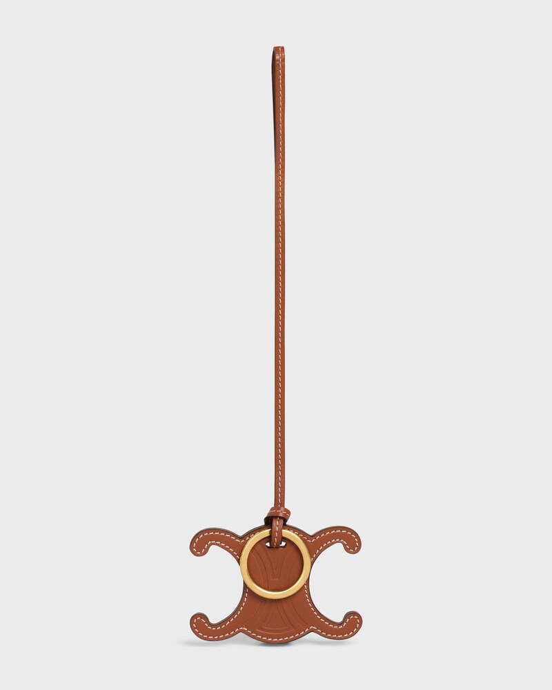 TRIOMPHE CHARM IN SMOOTH CALFSKIN - TAN - CHARMS AND ACCESSORIES - 1 | CELINE