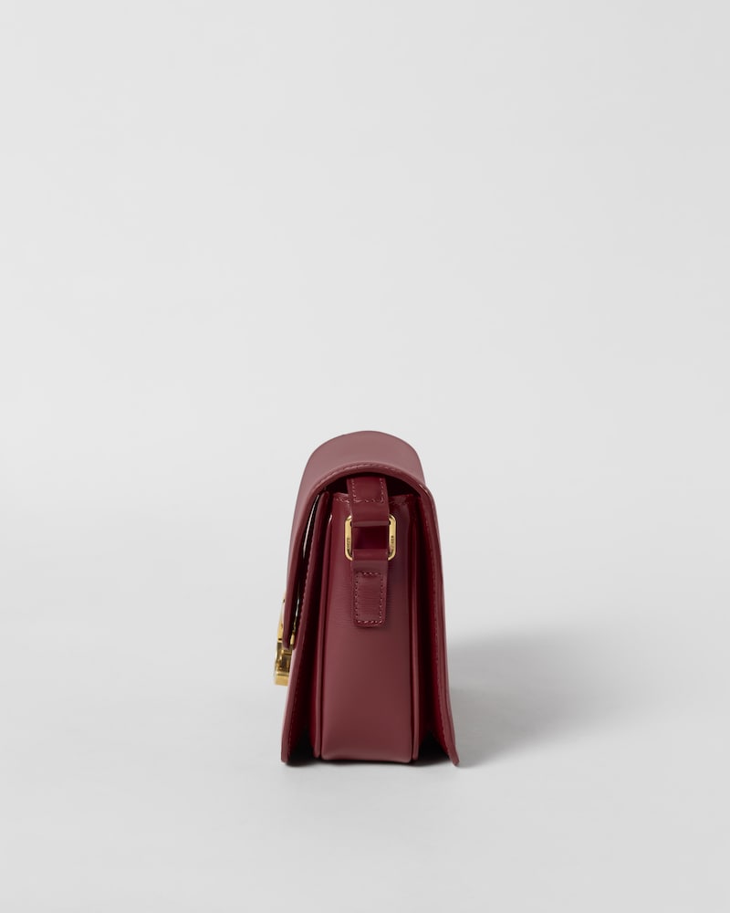 TEEN TRIOMPHE BAG IN SHINY CALFSKIN WITH ENAMEL CLOSURE - SYRAH - ALL BAGS - 1 | CELINE