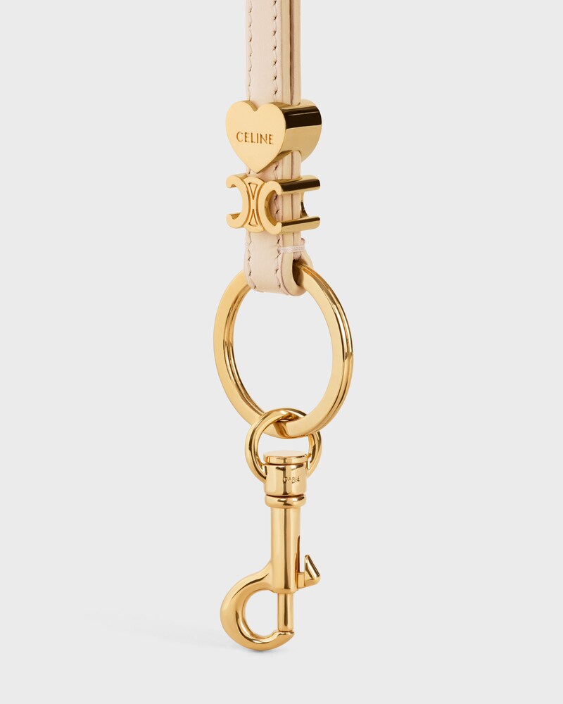 TRIOMPHE CHARM IN SMOOTH CALFSKIN - CREAM - CHARMS AND ACCESSORIES - 1 | CELINE