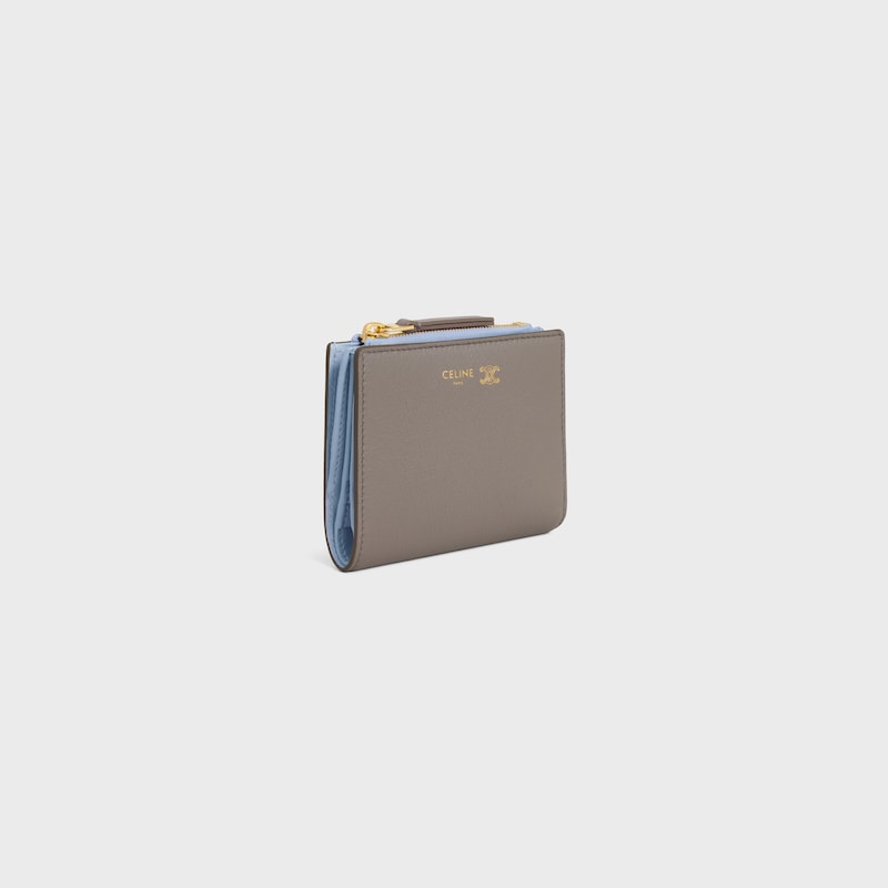 COMPACT WALLET TRIOMPHE STAMP IN SUPPLE GRAINED CALFSKIN - PEBBLE / LIGHT BLUE - WALLETS - 1 | CELINE