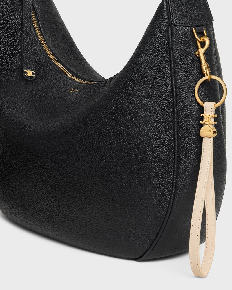 TRIOMPHE CHARM IN SMOOTH CALFSKIN - CREAM - CHARMS AND ACCESSORIES - 1 | CELINE