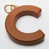 ALPHABET CHARMS C LETTER IN LAMBSKIN  AND BRASS WITH GOLD FINISH - GOLDEN TAN - CHARMS - 1 | CELINE