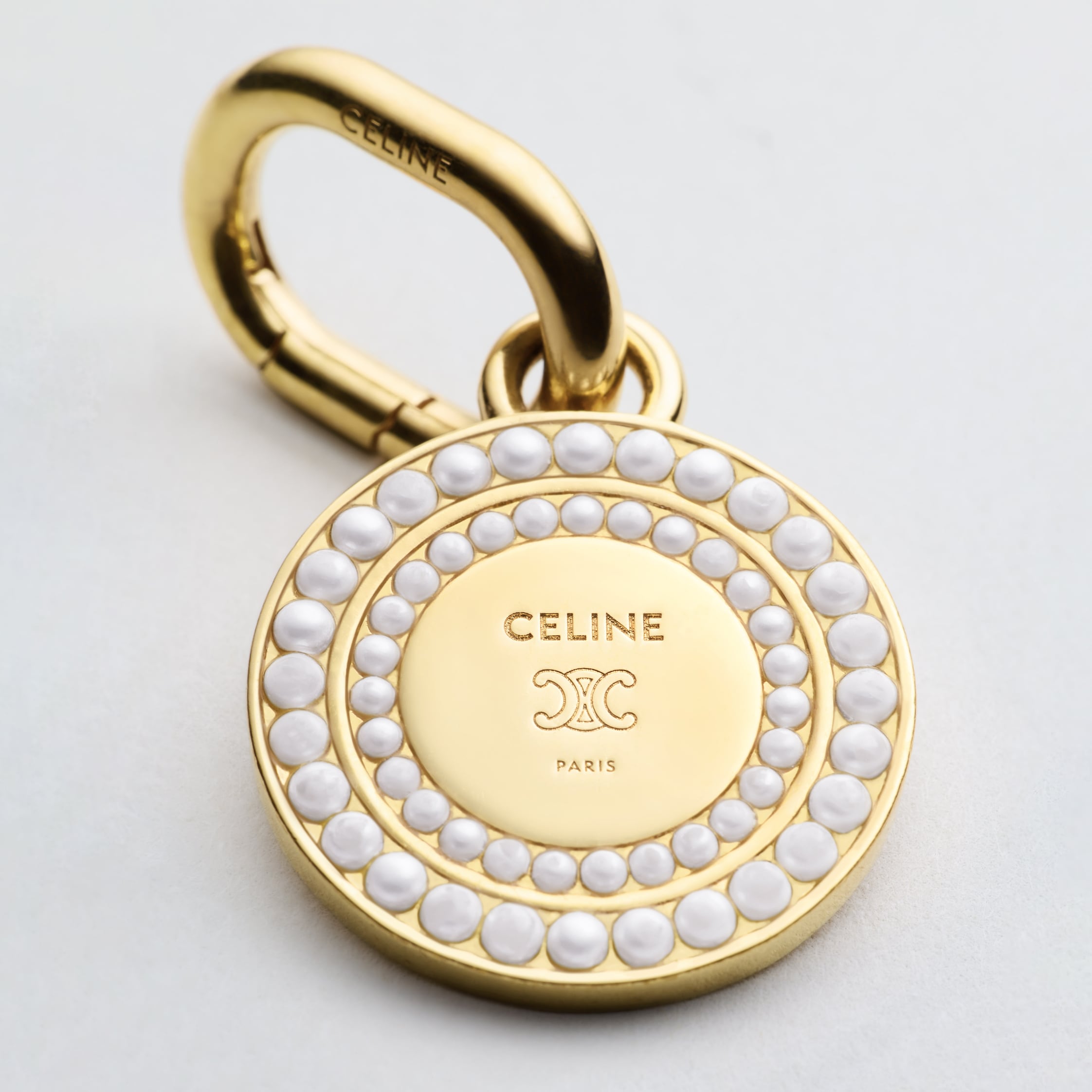 CELINE CHARMS PEARL MEDAL IN RESIN PEARLS AND BRASS WITH GOLD FINISH