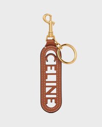 PERFORATED KEYRING CHARM CELINE IN SMOOTH CALFSKIN - TAN - BAG CHARMS - 1 | CELINE