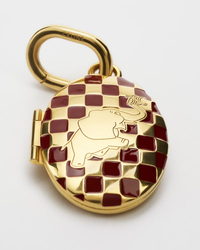 CHARMS ELEPHANT LOCKET IN BRASS WITH GOLD FINISH, ENAMEL AND STEEL - GOLD / BURGUNDY / SILVER - CHARMS - 1 | CELINE