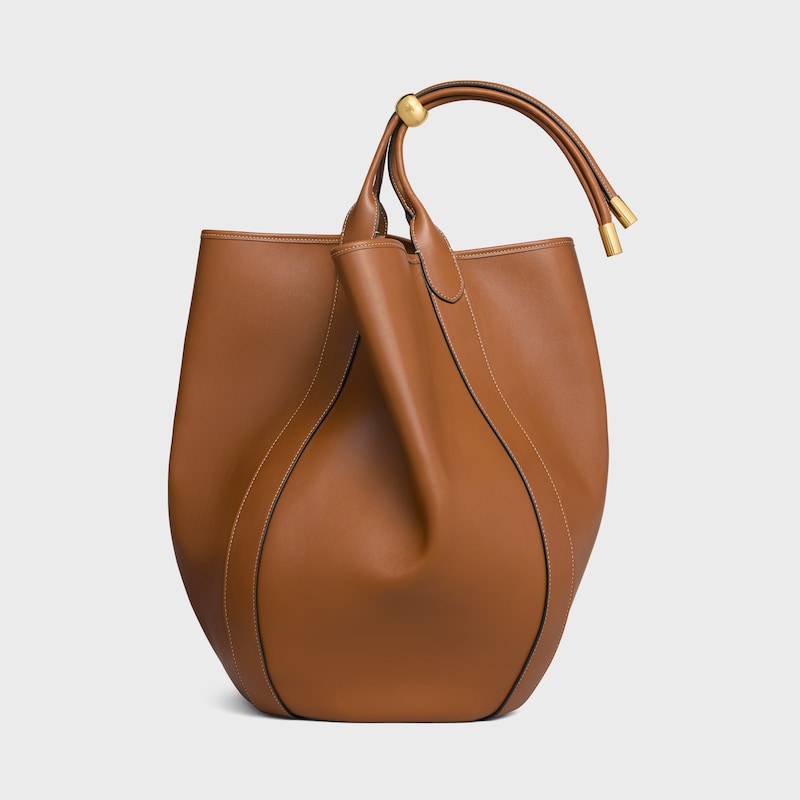 LARGE DROP BUCKET BAG IN SUPPLE SMOOTH CALFSKIN - GOLDEN TAN - &Eacute;T&Eacute; CELINE - 1 | CELINE