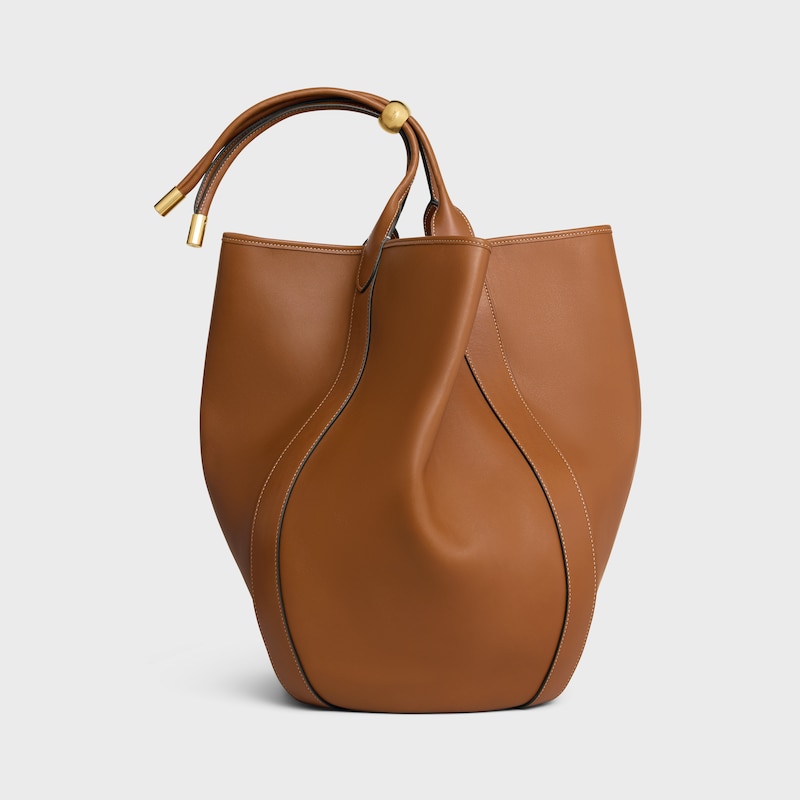 LARGE DROP BUCKET BAG IN SUPPLE SMOOTH CALFSKIN - GOLDEN TAN - &Eacute;T&Eacute; CELINE - 1 | CELINE