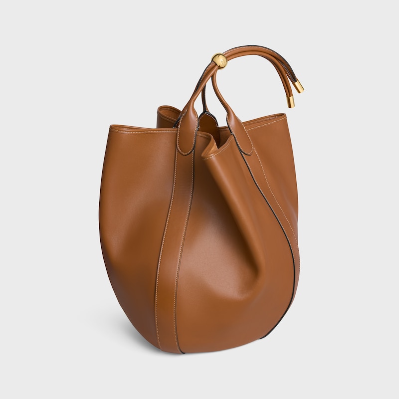 LARGE DROP BUCKET BAG IN SUPPLE SMOOTH CALFSKIN - GOLDEN TAN - &Eacute;T&Eacute; CELINE - 1 | CELINE