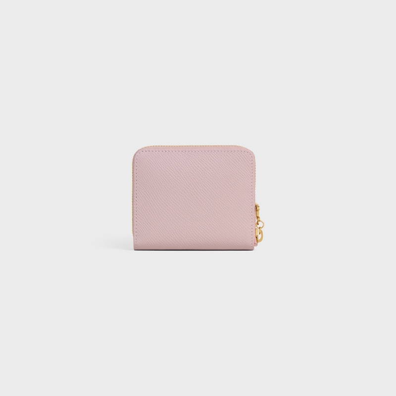 Small Zipped Wallet TRIOMPHE CHARMS IN GRAINED CALFSKIN - BLEACHED PINK - WALLETS - 1 | CELINE