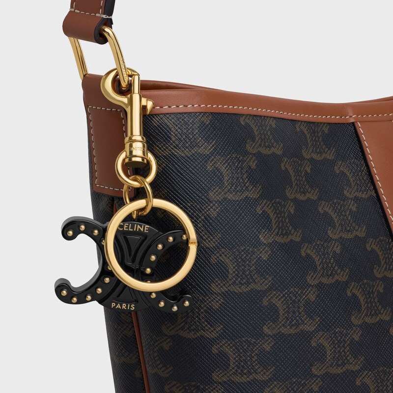 TRIOMPHE KEYRING CHARM in PLEXIGLASS with GOLD FINISHING - BLACK - BAG CHARMS - 1 | CELINE