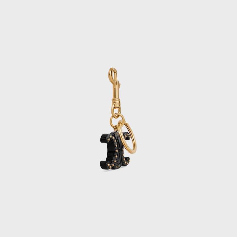 TRIOMPHE KEYRING CHARM in PLEXIGLASS with GOLD FINISHING - BLACK - BAG CHARMS - 1 | CELINE
