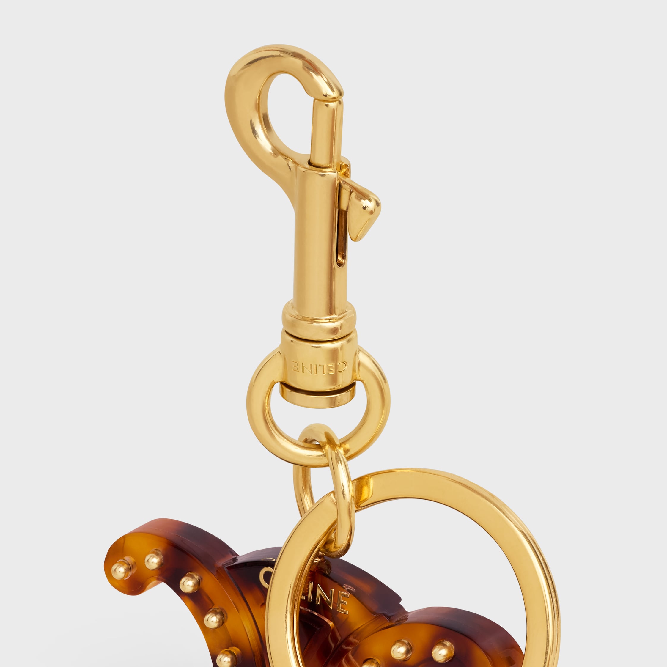 TRIOMPHE KEYRING CHARM in PLEXIGLASS with GOLD FINISHING