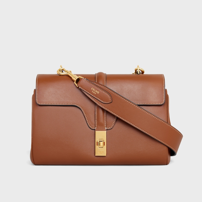 Long Strap in smooth calfskin with GOLD FINISHING - TAN - BAG CHARMS - 1 | CELINE