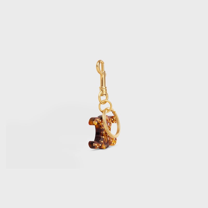 TRIOMPHE KEYRING CHARM in PLEXIGLASS with GOLD FINISHING - TORTOISESHELL - BAG CHARMS - 1 | CELINE
